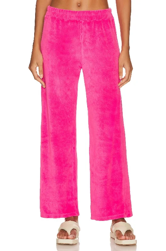 Pleated women trousers for a sophisticated and formal lookTerry High Waist Flare Pant In Azalea